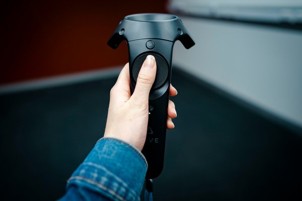 What are the considerations for designing user interfaces for mixed reality gaming experiences?